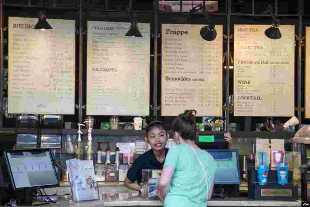 A staff receive order from customer at at Coffee Brown Roastery on 27th February 2015.