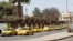 Yellow taxi cabs in Asmara, Eritrea - urban transportation - transport