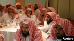 FILE - Members of Saudi Arabia's Committee for the Promotion of Virtue and Prevention of Vice, or religious police, also known as Haia or Mutawaa, attend a training course in Riyadh September 1, 2007.