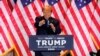 Republican presidential candidate and former U.S. President Donald Trump gestures as he speaks at a watch party marking the Super Tuesday primary elections at his Mar-a-Lago property, in Palm Beach, Florida, on March 5, 2024. 