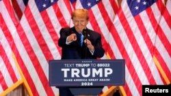 Republican presidential candidate and former U.S. President Donald Trump gestures as he speaks at a watch party marking the Super Tuesday primary elections at his Mar-a-Lago property, in Palm Beach, Florida, on March 5, 2024. 