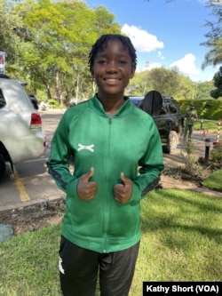 Lilian Mwenya, the youngest player in Zambian national women’s football team, is seen outside the Taj Pamodzi hotel in Lusaka, Zambia, Dec. 20, 2024.