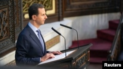 Presiden Suriah Bashar al-Assad berpidato di hadapan parlemen Suriah di Damaskus, Suriah, 25 Agustus 2024.