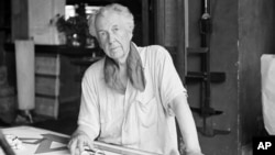 Frank Lloyd Wright, one of the greatest architects of the 20th century, is seen in his studio and home in Spring Green, Wisconsin, Aug. 16, 1938.