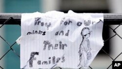 A handmade sign of support hangs on a fence on 08 Apr 2010 in Dorothy, West Virginia