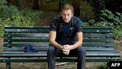 TOPSHOT - This handout picture posted on September 23, 2020 on the Instagram account of @navalny shows Russian opposition leader Alexei Navalny sitting on a bench in Berlin. - Russian opposition leader Alexei Navalny, who the West believes was…