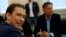 FILE - Austrian Conservative leader Sebastian Kurz, left, and Greens party chief Werner Kogler meet for coalition talks in Vienna, Austria, Nov. 15, 2019.