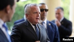 FILE - U.S. Deputy Secretary of State John J. Sullivan arrives in Asuncion, Paraguay, Sept. 6, 2019. Sullivan met with Haitian Foreign Minister Bocchit Edmond on the sidelines of the United Nations General Assembly in New York.