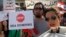 Lebanese protesters chant slogans during a protest against corruption and criticizing long-serving politicians for failing to form a government, in Beirut, Lebanon, Nov. 22, 2018.