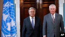 Secretary of State Rex Tillerson, right, walks with ‎U.N. Secretary-General Antonio Guterres, Wednesday, June 28, 2017, at the State Department in Washington. 