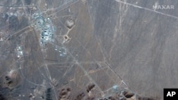 This Nov. 4, 2020, satellite photo by Maxar Technologies shows Iran's Fordo nuclear site. Iran has begun construction on a site at its underground nuclear facility at Fordo, satellite photos obtained Friday, Dec. 18, 2020, by the Associated Press show.