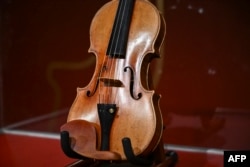 The Joachim-Ma Stradivarius violin sits on display during a preview of the violin's auction at Sotheby’s in New York, Feb. 3, 2025.