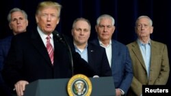 U.S. President Donald Trump speaks to the media after the Congressional Republican Leadership retreat at Camp David, Maryland, Jan. 6, 2018. From left are House Majority Leader Kevin McCarthy (R-CA), Trump, House Majority Whip Steve Scalise (R-LA), Secretary of State Rex Tillerson and Defense Secretary James Mattis.