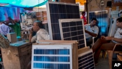 Solar panels are displayed for sale at a market in New Delhi, India. India plans a fivefold boost in renewable energy capacity in the next five years to 175 gigawatts, including solar power, wind, biomass and small hydropower dams, October 1, 2015.