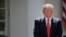 President Donald Trump stands next to the podium after speaking about the U.S. role in the Paris climate change accord in the Rose Garden of the White House in Washington, June 1, 2017. 