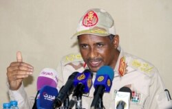 FILE - Lt. Gen. Mohamed Hamdan Dagalo, deputy head of the military council and head of the Sudanese paramilitary Rapid Support Forces, addresses a news conference in Juba, South Sudan, Jan. 14, 2020.