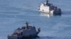 Taiwanese navy Kuang Hua VI-class missile boats move within the harbour of Keelung