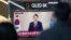 FILE - People watch a TV broadcast showing South Korean President Yoon Suk Yeol, at Seoul Railway Station in Seoul, South Korea, Dec. 12, 2024. On Dec. 15, North Korean media reported on Yoon's impeachment by South Korean parliament.