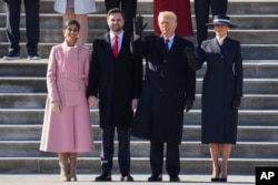 Second lady Usha Vance, left, Vice President JD Vance, second from left, President Donald Trump, second from right, and first lady Melania Trump are seen at the U.S. Capitol in Washington, Jan. 20, 2025.