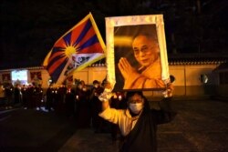 Tibetans in Taiwan attend a gathering to mark the 62nd anniversary of the failed 1959 Tibetan uprising against Chinese rule in Taipei on March 10, 2021. Ann Wang/Reuters