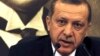 Turkey's Prime Minister Recep Tayyip Erdogan, speaks during a news conference at Ataturk International airport in Istanbul, April 4, 2014. 