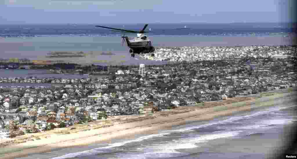 Marine One with &nbsp;President Barack Obama and New Jersey Governor Chris Christie on board view the storm damage around Atlantic City, New Jersey, October 31, 2012.