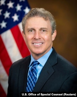 FILE - Hampton Dellinger of the U.S. Office of Special Counsel