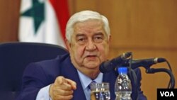 Minis afè etranjè siryen an, Walid al-Moallem, pa mete dlo nan bouch li pou l kritike dènye desizyon Lig Arab la