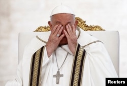 Pope Francis gestures at a Mass to open the Synod of Bishops in St. Peter's square at the Vatican, Oct. 2, 2024.