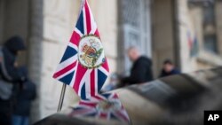 The British Union flag flies from the front of a car as British ambassador to Russia, Laurie Bristow attends a meeting at the Russian foreign ministry building in Moscow, Russia, March 17, 2018. 