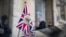 The British Union flag flies from the front of a car as British ambassador to Russia, Laurie Bristow attends a meeting at the Russian foreign ministry building in Moscow, Russia, March 17, 2018. 