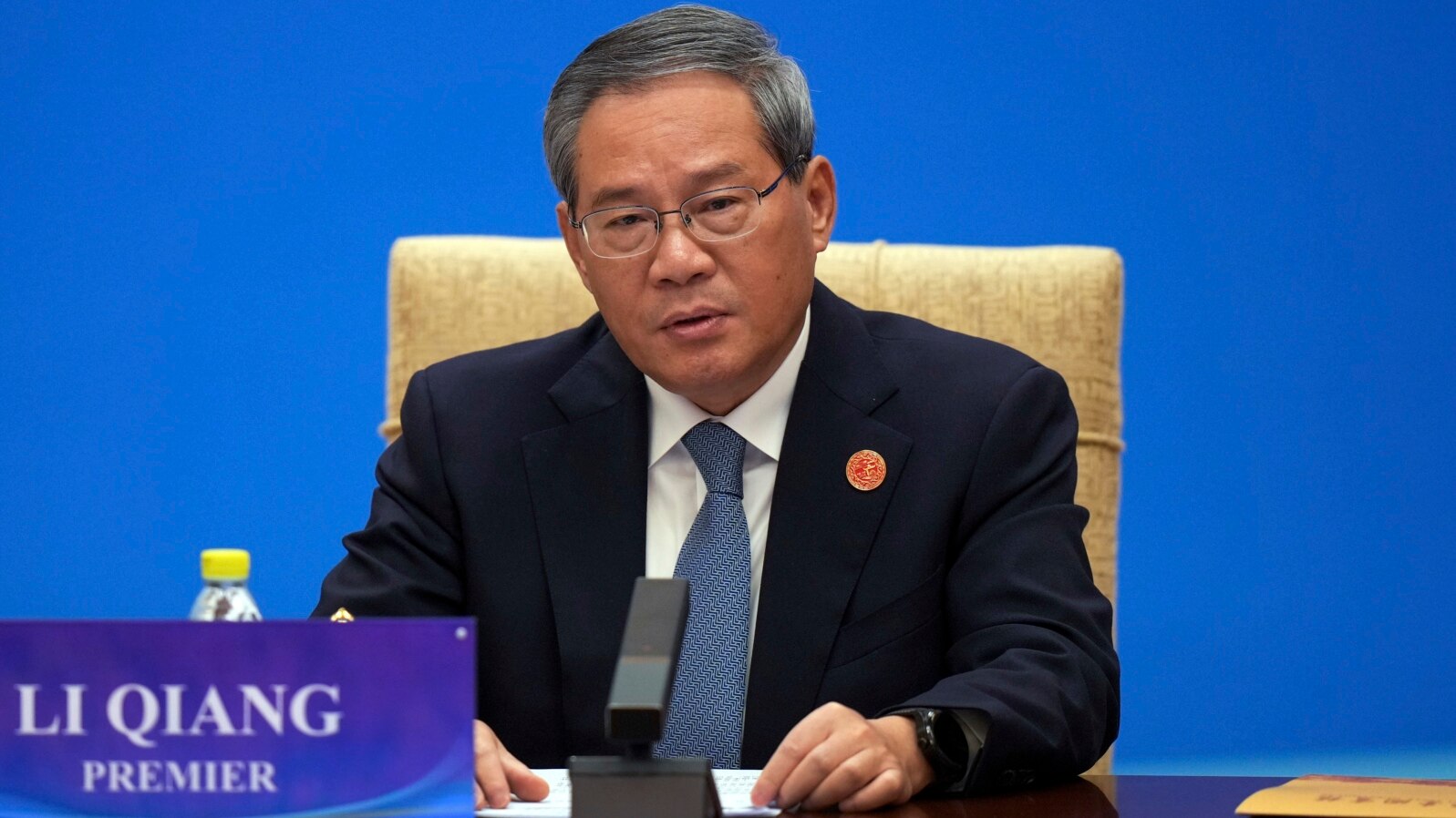 FILE - Chinese Premier Li Qiang speaks as he chairs the "1+10" Dialogue on Building Consensus on Development to Promote Global Common Prosperity, at the Diaoyutai State Guesthouse in Beijing, Dec. 9, 2024. 