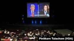 Students attend the presidential debate watch party at Temple University’s Klein College of Media and Communication in Philadelphia, PA