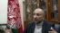 FILE - Afghan National Security Adviser Hanif Atmar speaks with The Associated Press, in Kabul, Afghanistan, Oct. 24, 2015.