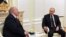 Russian President Vladimir Putin attends a meeting with his Belarusian counterpart Alexander Lukashenko in Moscow on April 22, 2021. 