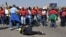 Civil servants workers protest outside the Natalaspruit hospital demanding better salary increases in Johannesburg, 18 Aug 2010, after the Unions rejected the government's offer
