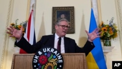 Britain's Prime Minster Keir Starmer gestures as he speaks during a reception on the third anniversary of Russia's invasion of Ukraine in London, Feb. 24, 2025.