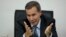 FILE - Alberto Nisman, the prosecutor investigating the 1994 bombing of the Argentine-Israeli Mutual Association community center, talks to journalists in Buenos Aires, Argentina, May 29, 2013.
