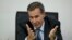FILE - Alberto Nisman, the prosecutor investigating the 1994 bombing of the Argentine-Israeli Mutual Association community center, talks to journalists in Buenos Aires, Argentina, May 29, 2013.