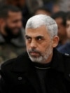 FILE PHOTO: Hamas leader Yehia Sinwar attends a rally in Khan Younis in the southern Gaza Strip