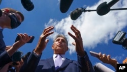 FILE - Sen. Joe Manchin, D-W.Va., talks with reporters at the Capitol in Washington, Sept. 30, 2021.