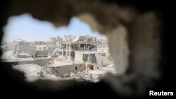 Damaged buildings are pictured during the fighting with Islamic State's fighters in the old city of Raqqa, Syria, Aug. 19, 2017. 