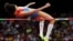 FILE - Russia's Anna Chicherova competes in the women's high jump final at the World Athletics Championships at the Bird's Nest stadium in Beijing, Aug. 29, 2015. 