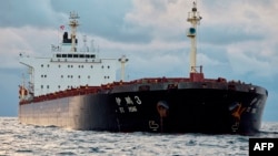 FILE - The Chinese bulk carrier Yi Peng 3 is anchored near Jutland, Denmark, Nov. 20, 2024. On Dec. 19, Denmark announced that China allowed investigators from four European nations to board the ship, which is suspected in the breach of undersea cables.