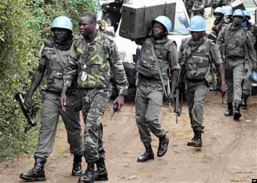 UN troops patrol in Abidjan, Ivory Coast, 12 Dec 2010