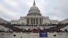 FILE - A mob of supporters of U.S. President Donald Trump storm the U.S. Capitol Building in Washington, U.S., Jan. 6, 2021. 