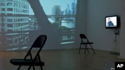 A video installation in the Winkleman Gallery "Brooklyn Bridge" exhibition by Gulnara Kasmalieva and Muratbek Djumaliev in New York City