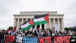 Supporters of the Palestinians rally during the National March for Palestine demonstration at the Lincoln Memorial in Washington, May 29, 2021.
