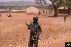 FILE — A Nigerian Soldier patrol sat the LEA Primary and Secondary School Kuriga where students were kidnapped in Kuriga, Kaduna Nigeria, March 9, 2024.