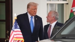 U.S. President Donald Trump greets Jordan's King Abdullah II at the White House on Feb. 11, 2025, in Washington.